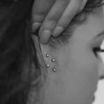 double-surface-tragus-piercing