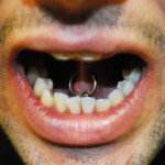 Guy-tongue-piercing-webbing