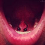 black-circular-barbell-web-tongue-piercing